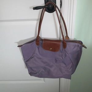 Used Authentic Longchamp medium sized purple tote